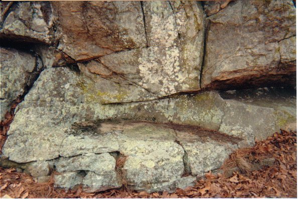 Square inset sandstone above ledge