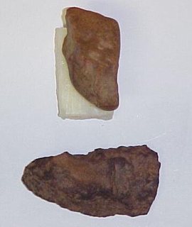 Closeups of crude knapped edge ironstone tools
